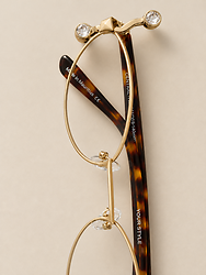 IMAN PARA COLGAR LENTES